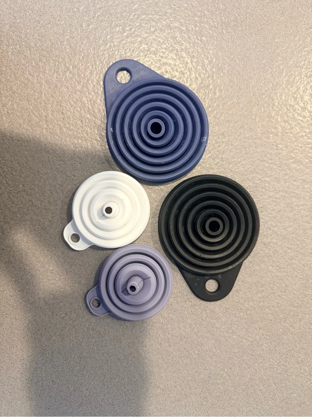 Set of 4 Silicone Collapsible Funnels in Blue, Black, White, and Lavender